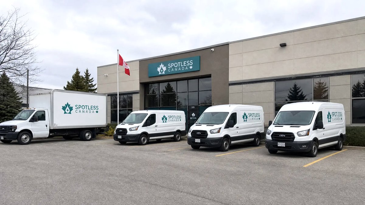 Spotless Canada headquarters with branded fleet of vans and trucks
